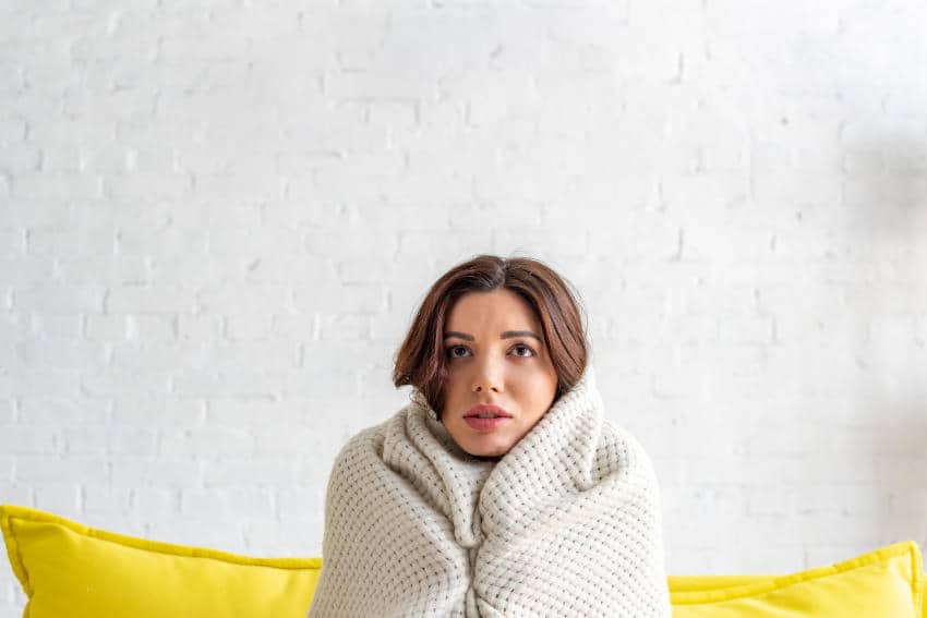 Cold Young Women Wrapped In Blanket-No Unit